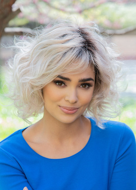 front side of a medium Kinner Beauty Wigs wig on woman head