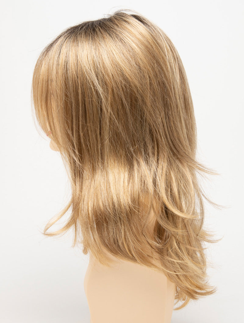 profile side of a long Kinner Beauty Wigs wig for woman on mannequin head