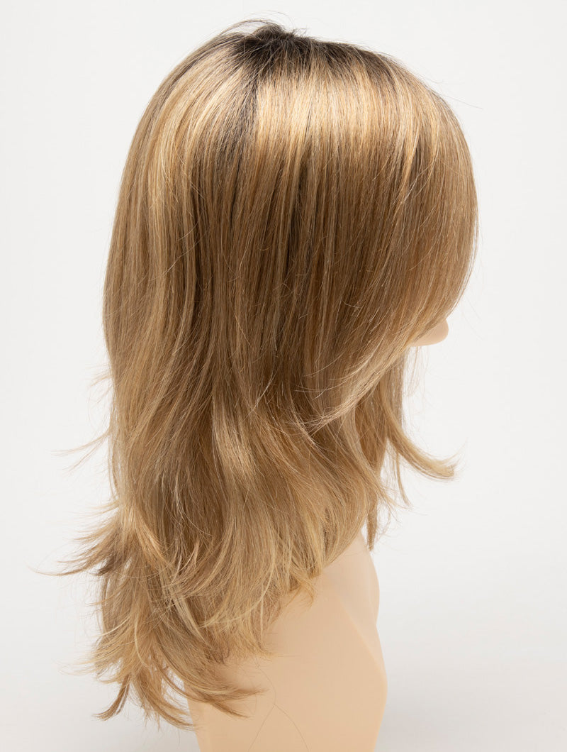 profile side of a long Kinner Beauty Wigs wig for woman on mannequin head