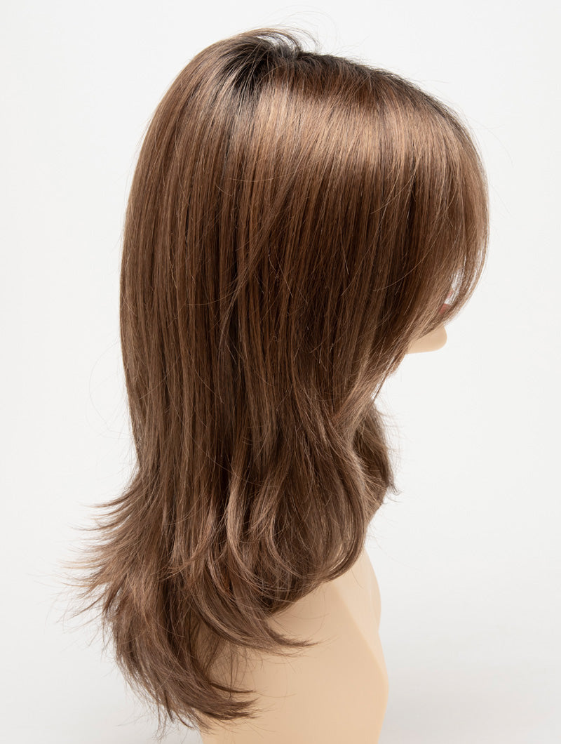 profile side of a long Kinner Beauty Wigs wig for woman on mannequin head
