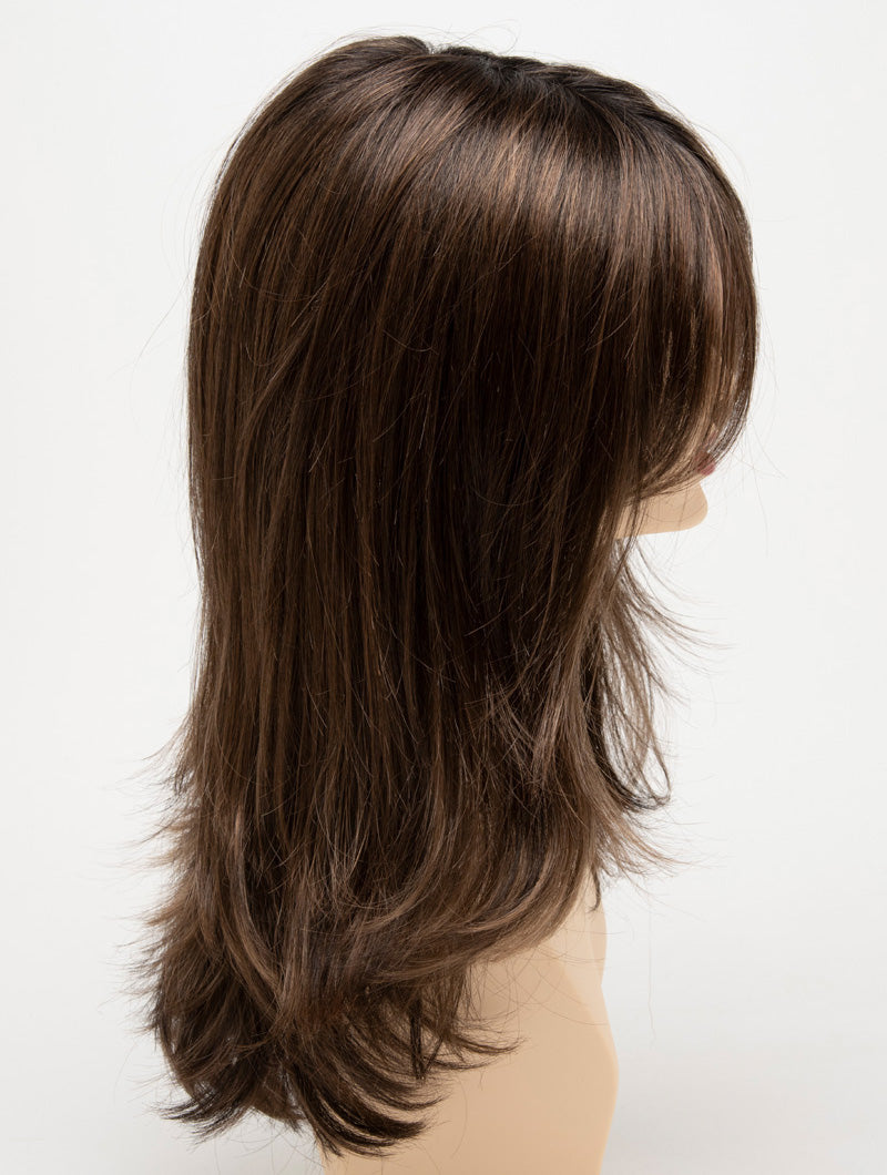 profile side of a long Kinner Beauty Wigs wig for woman on mannequin head