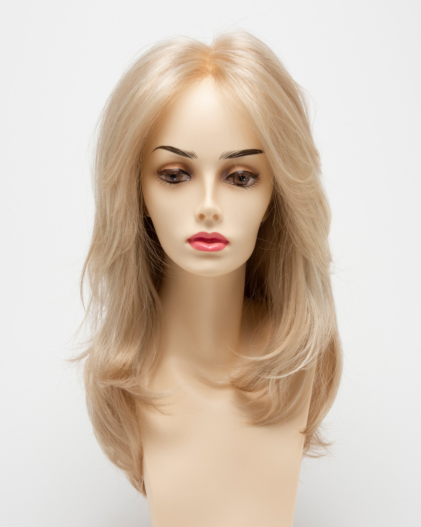 front side of a long Kinner Beauty Wigs wig for woman on mannequin head
