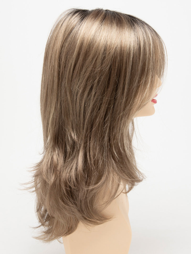profile side of a long Kinner Beauty Wigs wig for woman on mannequin head
