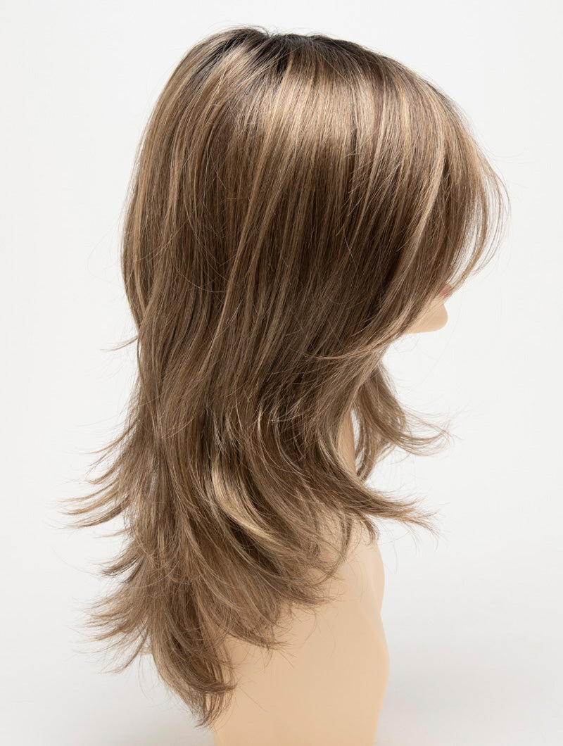 profile side of a long Kinner Beauty Wigs wig for woman on mannequin head