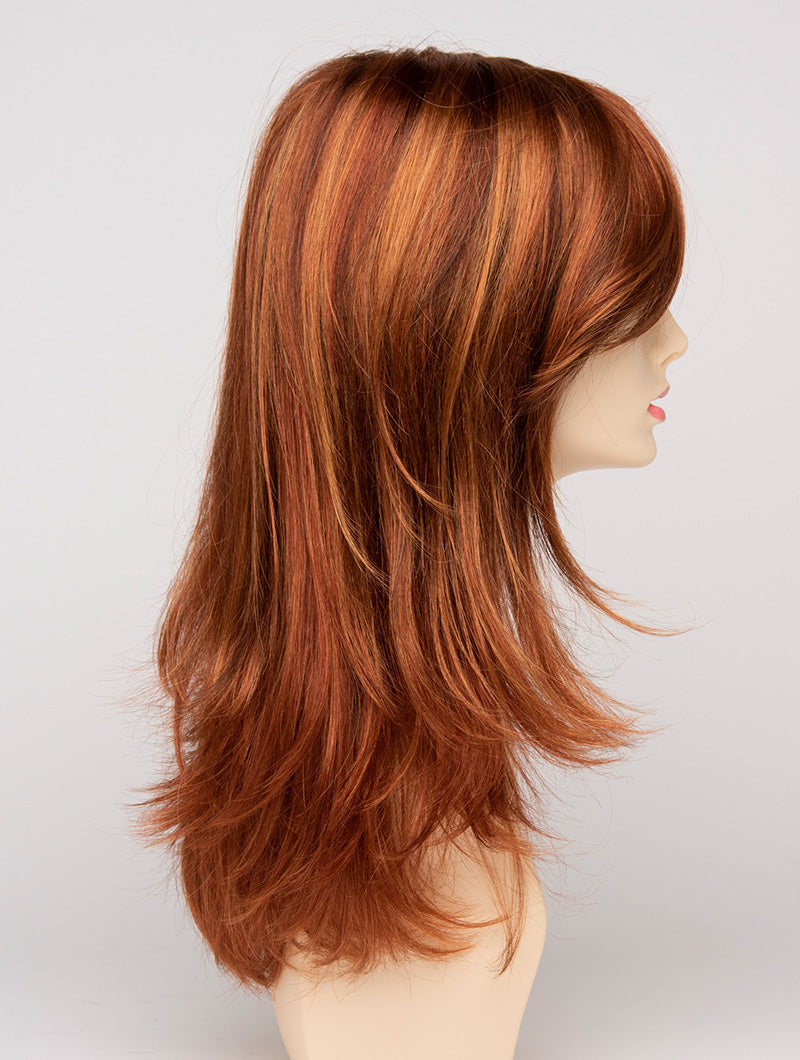 profile side of a long Kinner Beauty Wigs wig for woman on mannequin head