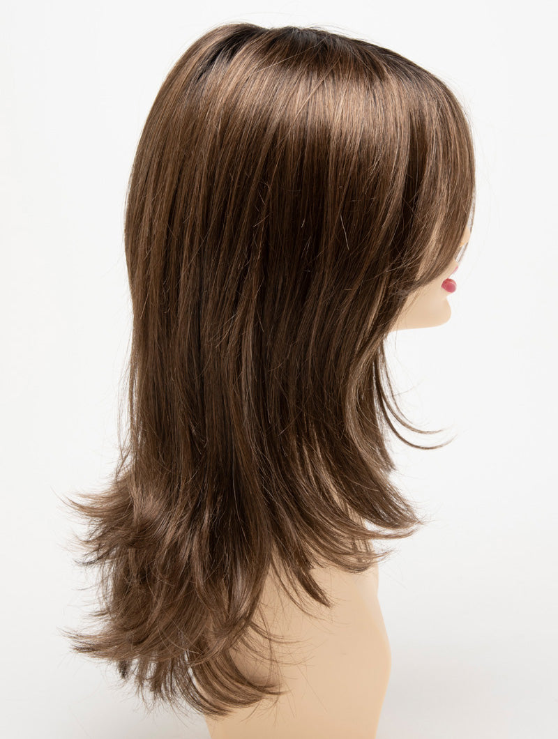 profile side of a long Kinner Beauty Wigs wig for woman on mannequin head
