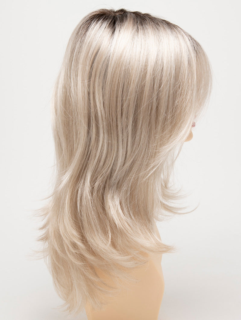 profile side of a long Kinner Beauty Wigs wig for woman on mannequin head
