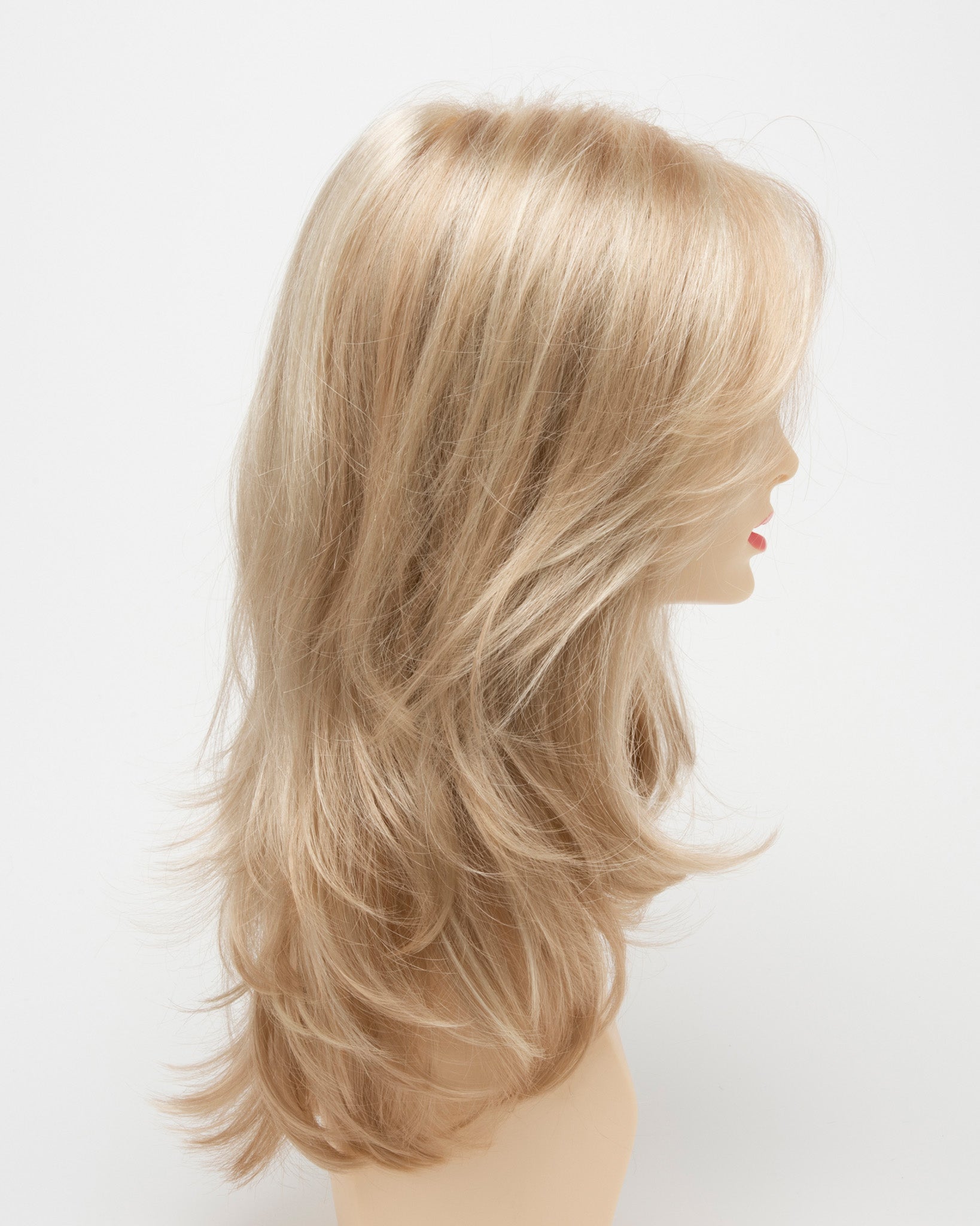 profile side of a long Kinner Beauty Wigs wig for woman on mannequin head