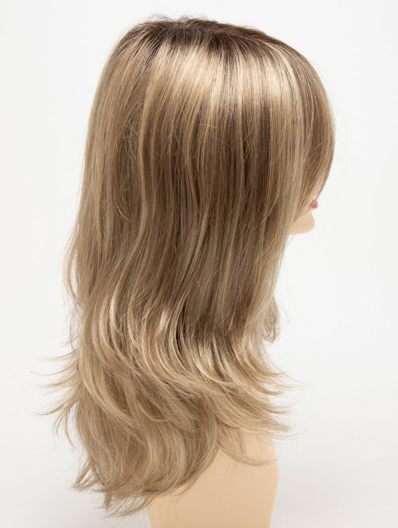 profile side of a long Kinner Beauty Wigs wig for woman on mannequin head