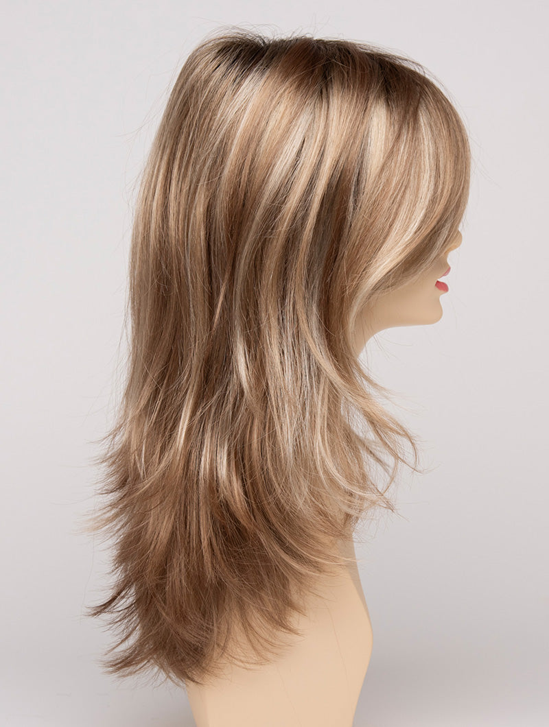 profile side of a long Kinner Beauty Wigs wig for woman on mannequin head