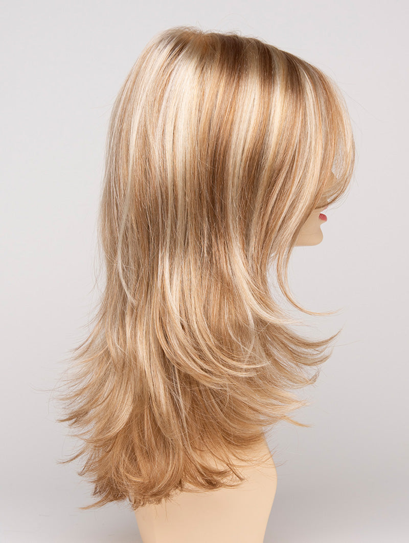 profile side of a long Kinner Beauty Wigs wig for woman on mannequin head