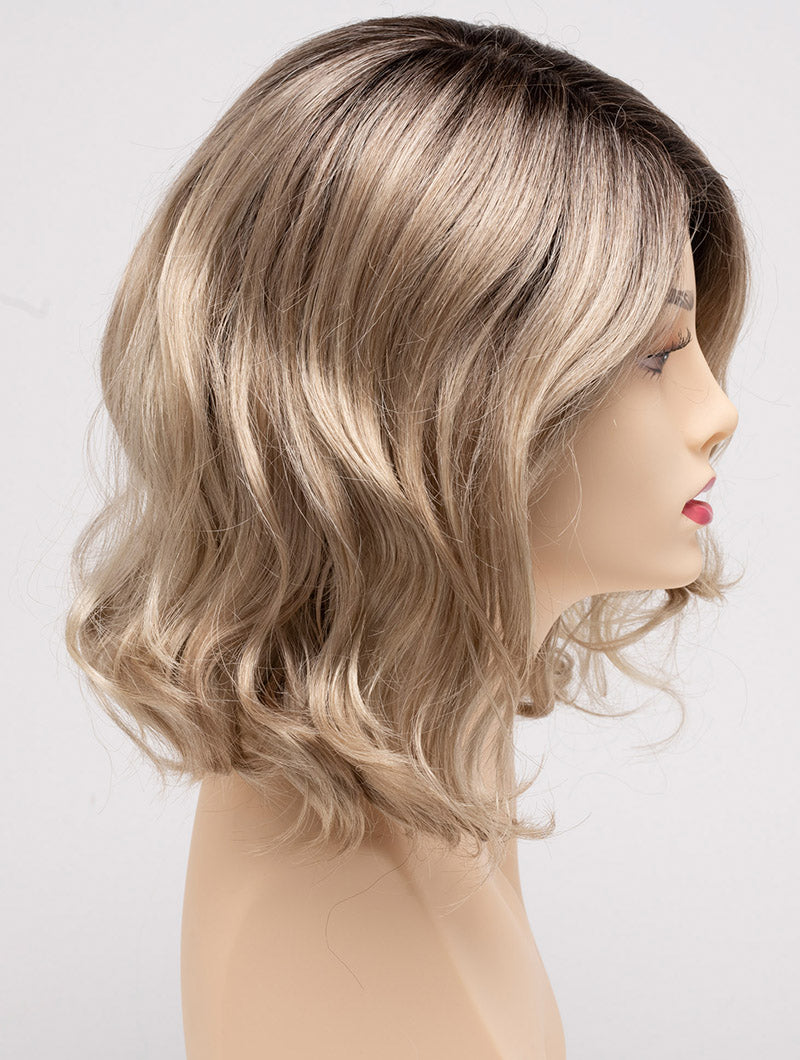 profile side of a medium Kinner Beauty Wigs wig for woman on mannequin head