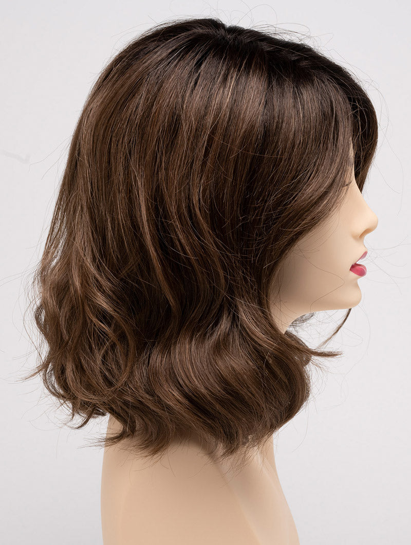 profile side of a medium Kinner Beauty Wigs wig for woman on mannequin head