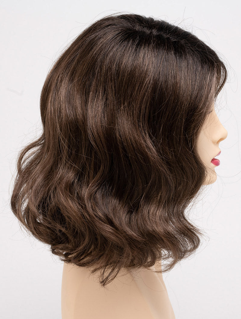 profile side of a medium Kinner Beauty Wigs wig for woman on mannequin head
