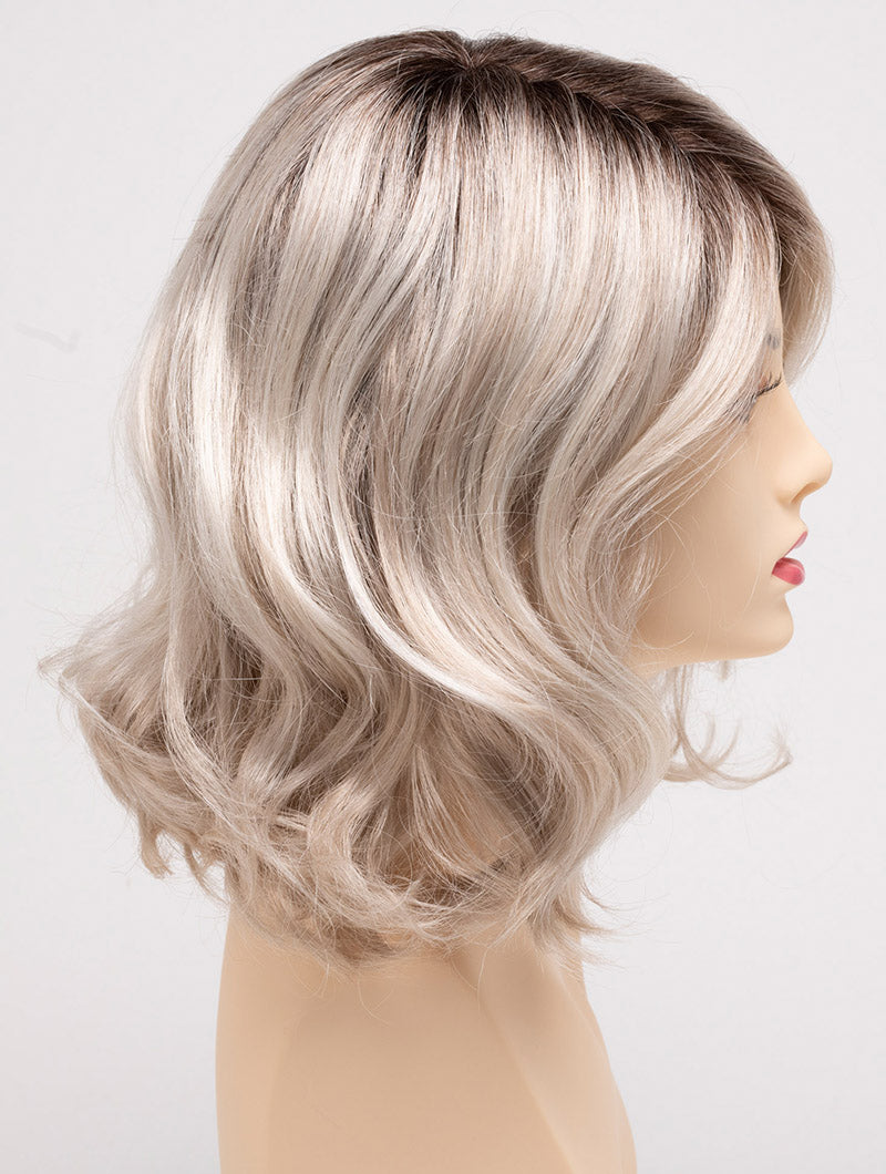 profile side of a medium Kinner Beauty Wigs wig for woman on mannequin head