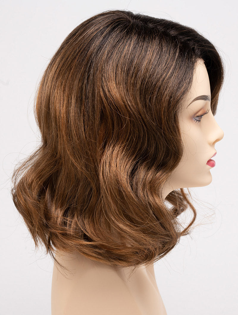 profile side of a medium Kinner Beauty Wigs wig for woman on mannequin head