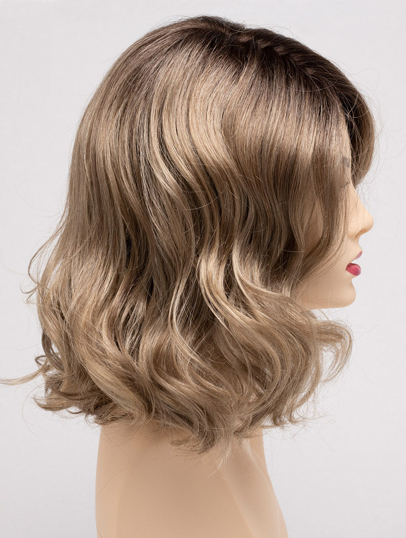 profile side of a medium Kinner Beauty Wigs wig for woman on mannequin head