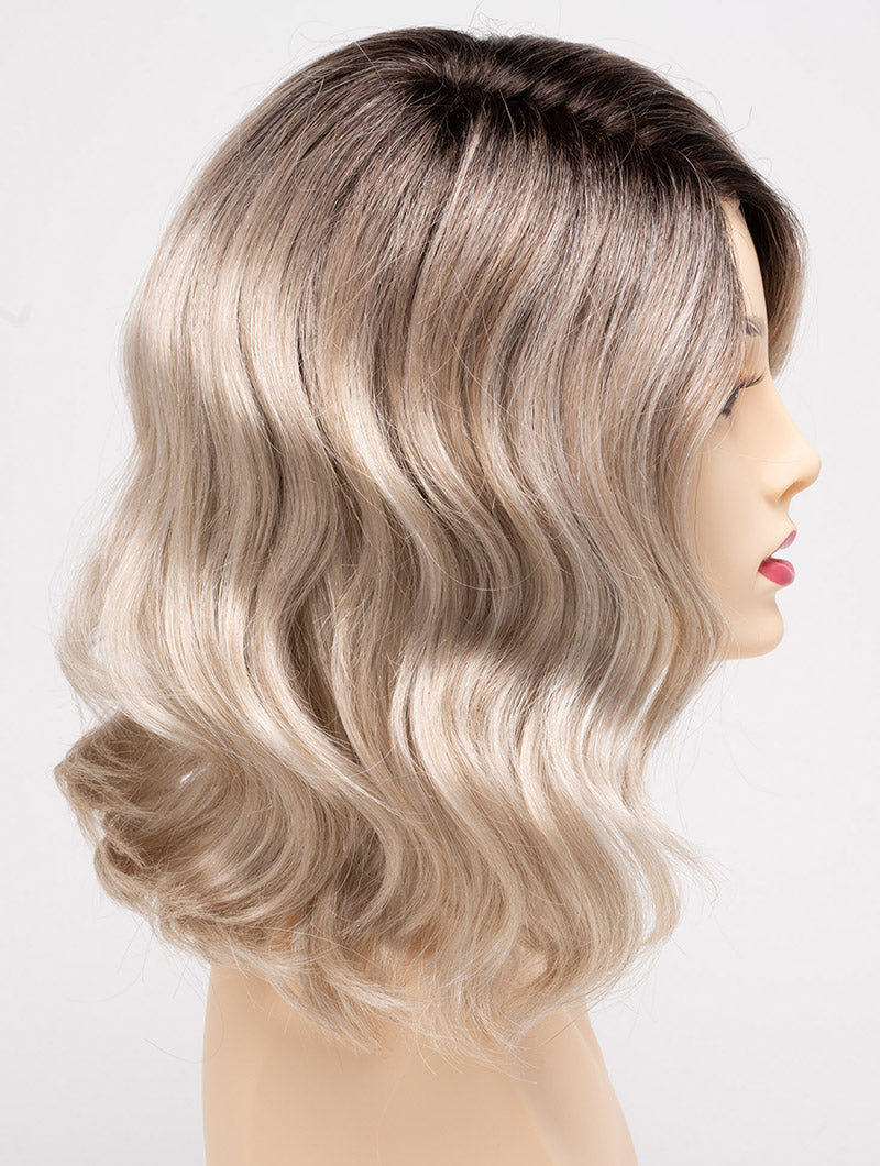 profile side of a medium Kinner Beauty Wigs wig for woman on mannequin head