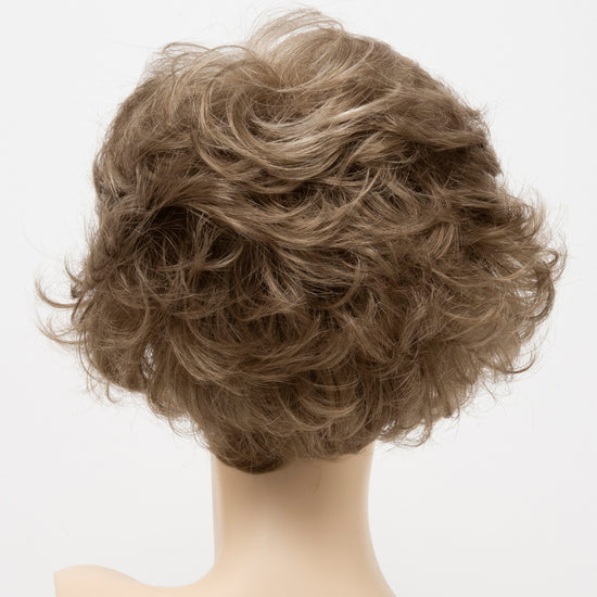 back side of a short Kinner Beauty Wigs wig for woman on mannequin head