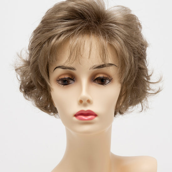 front side of a short Kinner Beauty Wigs wig for woman on mannequin head