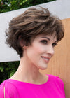 profile side of a short Kinner Beauty Wigs wig on woman head