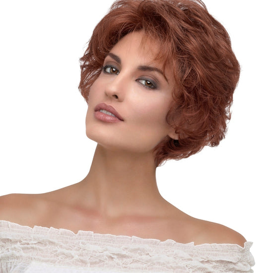 front side of a short Kinner Beauty Wigs wig on woman head