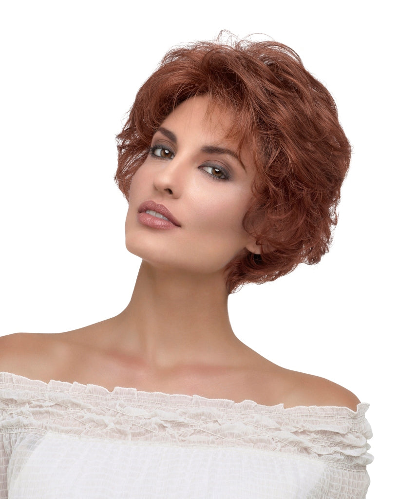front side of a short Kinner Beauty Wigs wig on woman head