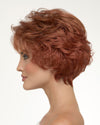 profile side of a short Kinner Beauty Wigs wig on woman head