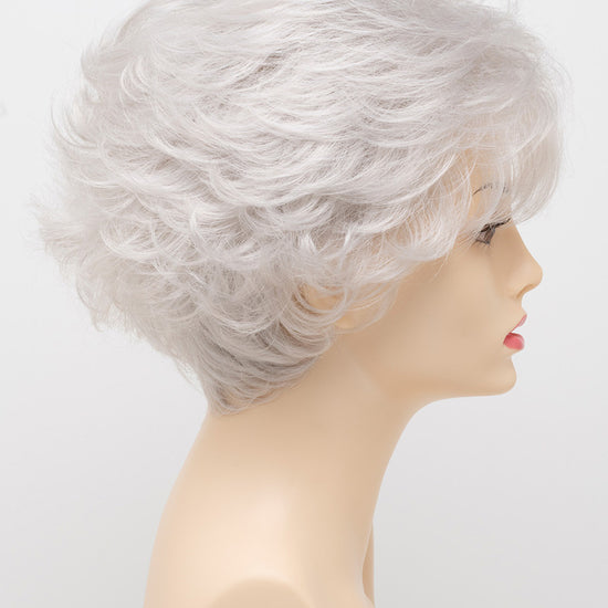 profile side of a short Kinner Beauty Wigs wig for woman on mannequin head