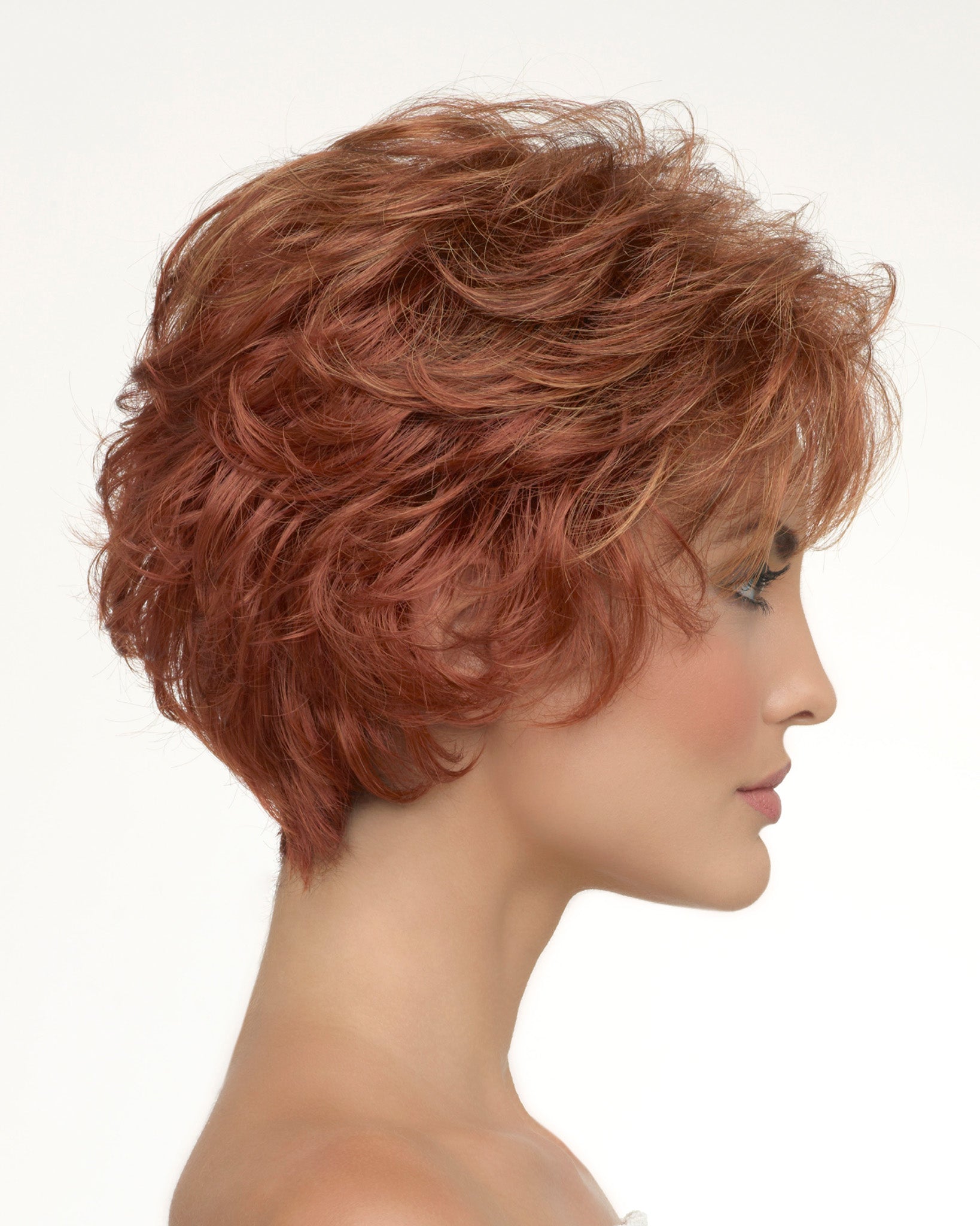profile side of a short Kinner Beauty Wigs wig on woman head