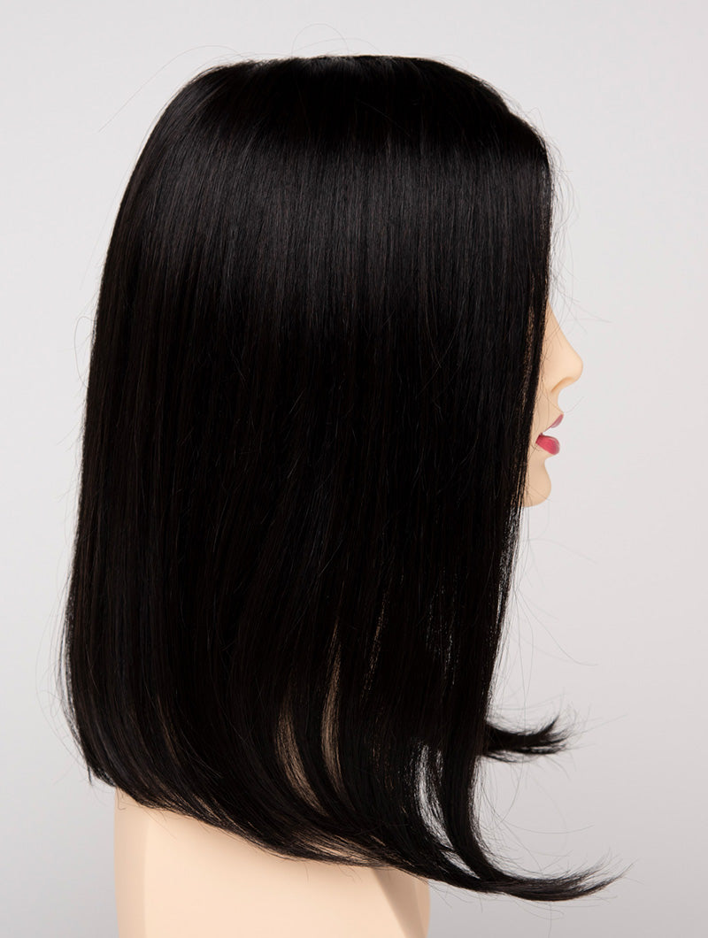 profile side of a medium Kinner Beauty Wigs wig for woman on mannequin head