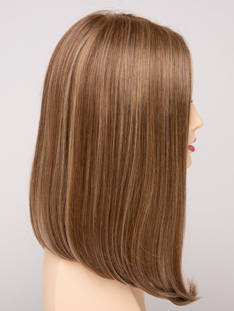 profile side of a medium Kinner Beauty Wigs wig for woman on mannequin head