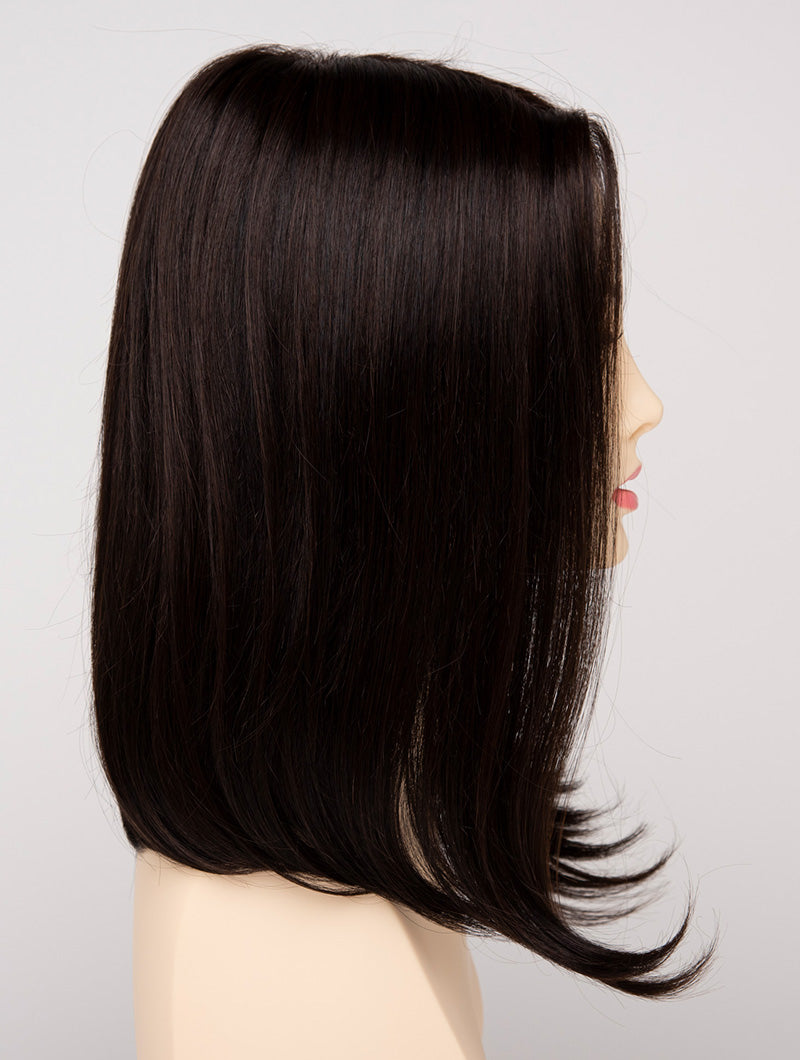 profile side of a medium Kinner Beauty Wigs wig for woman on mannequin head