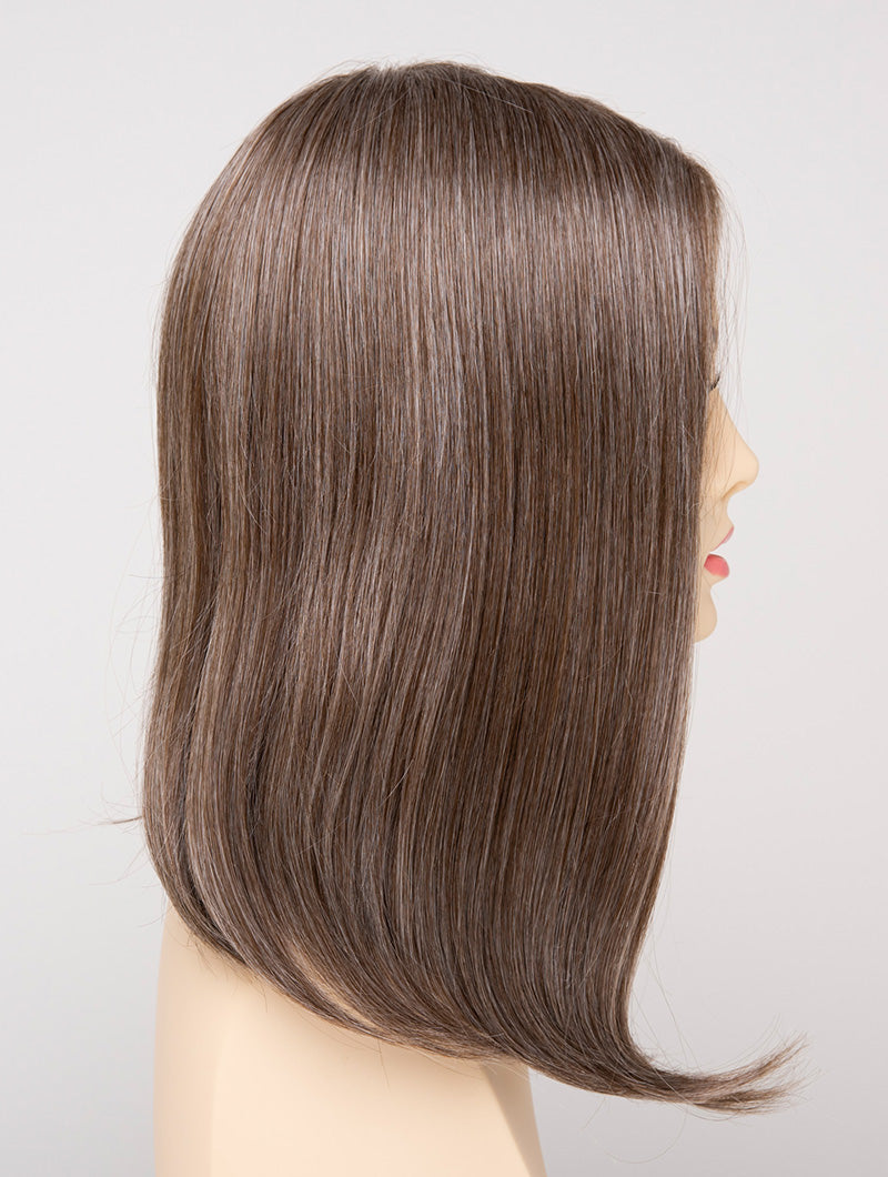 profile side of a medium Kinner Beauty Wigs wig for woman on mannequin head