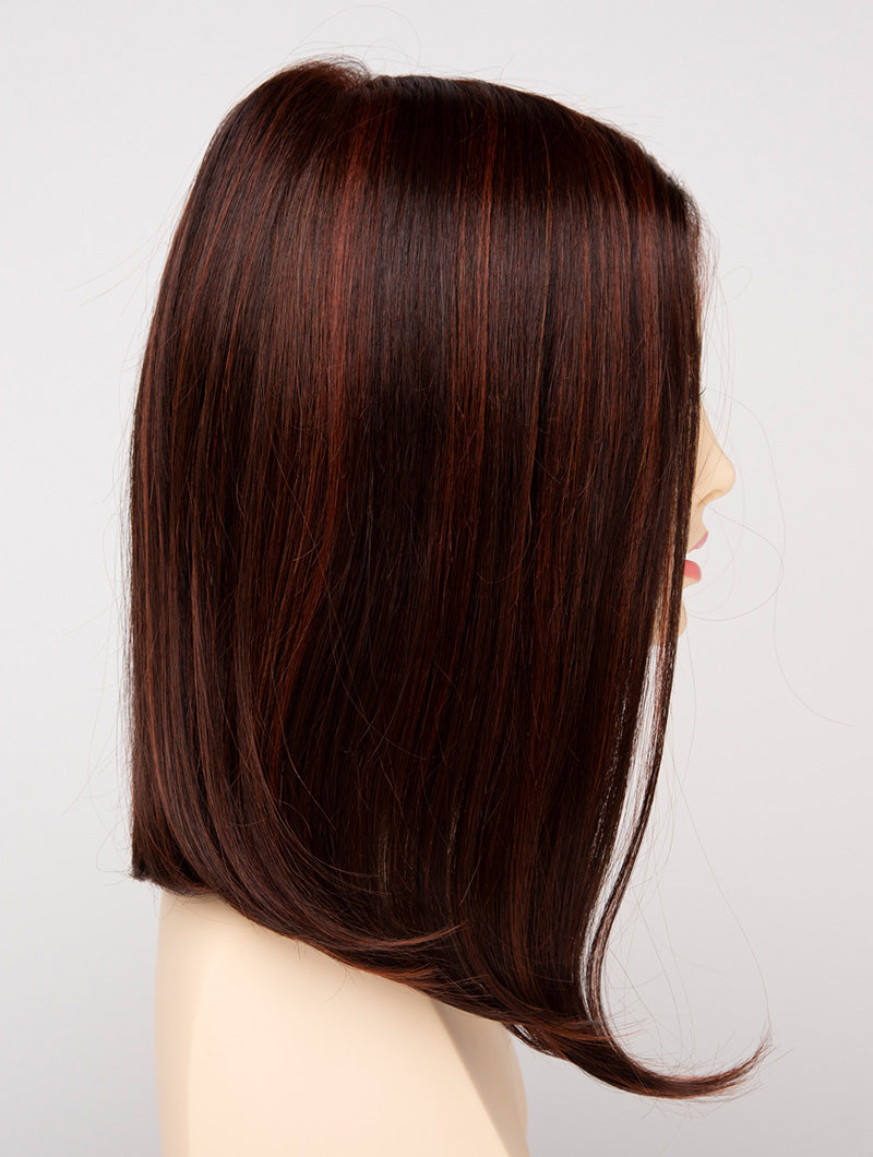 profile side of a medium Kinner Beauty Wigs wig for woman on mannequin head