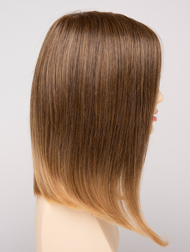 profile side of a medium Kinner Beauty Wigs wig for woman on mannequin head