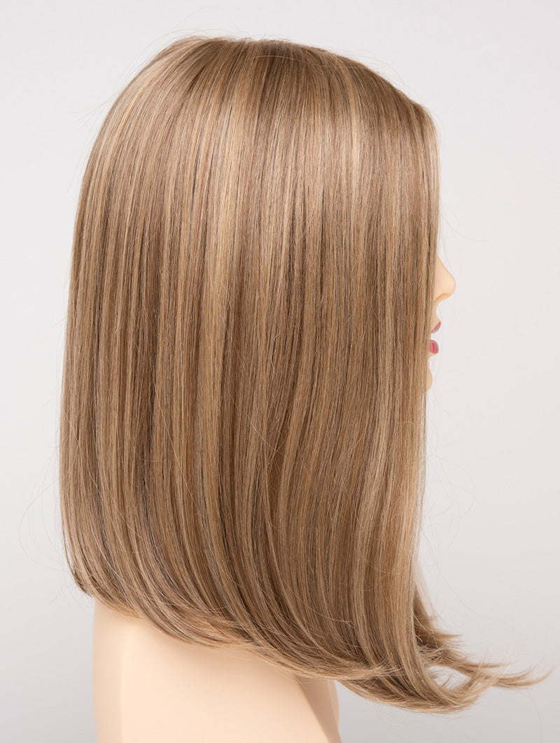 profile side of a medium Kinner Beauty Wigs wig for woman on mannequin head