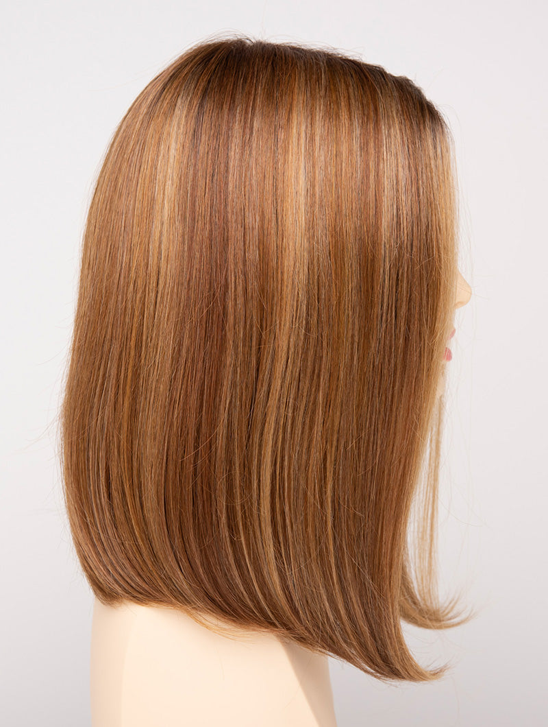 profile side of a medium Kinner Beauty Wigs wig for woman on mannequin head