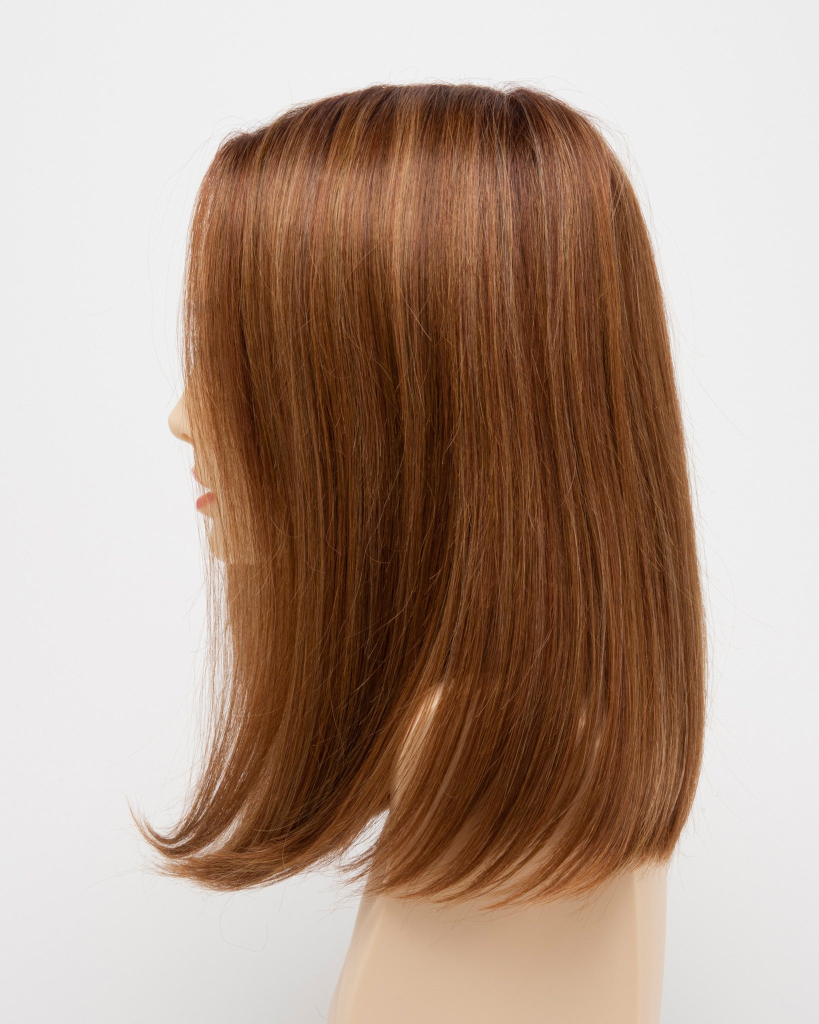 profile side of a medium Kinner Beauty Wigs wig for woman on mannequin head