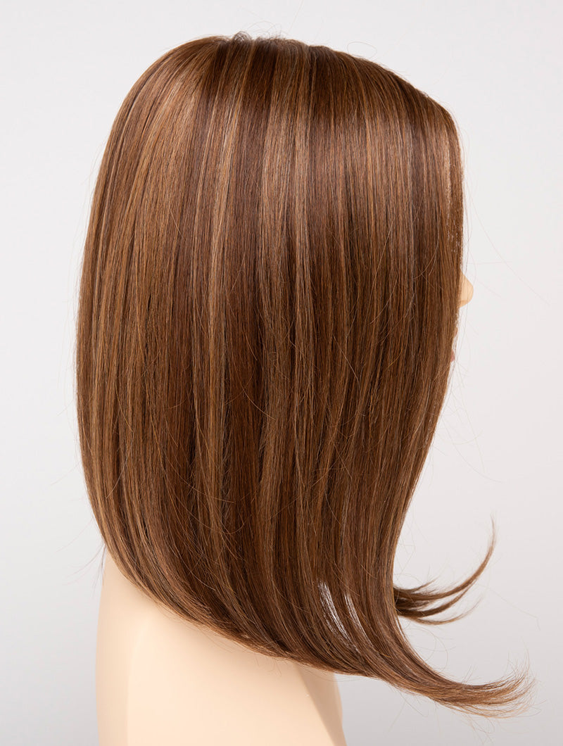 profile side of a medium Kinner Beauty Wigs wig for woman on mannequin head