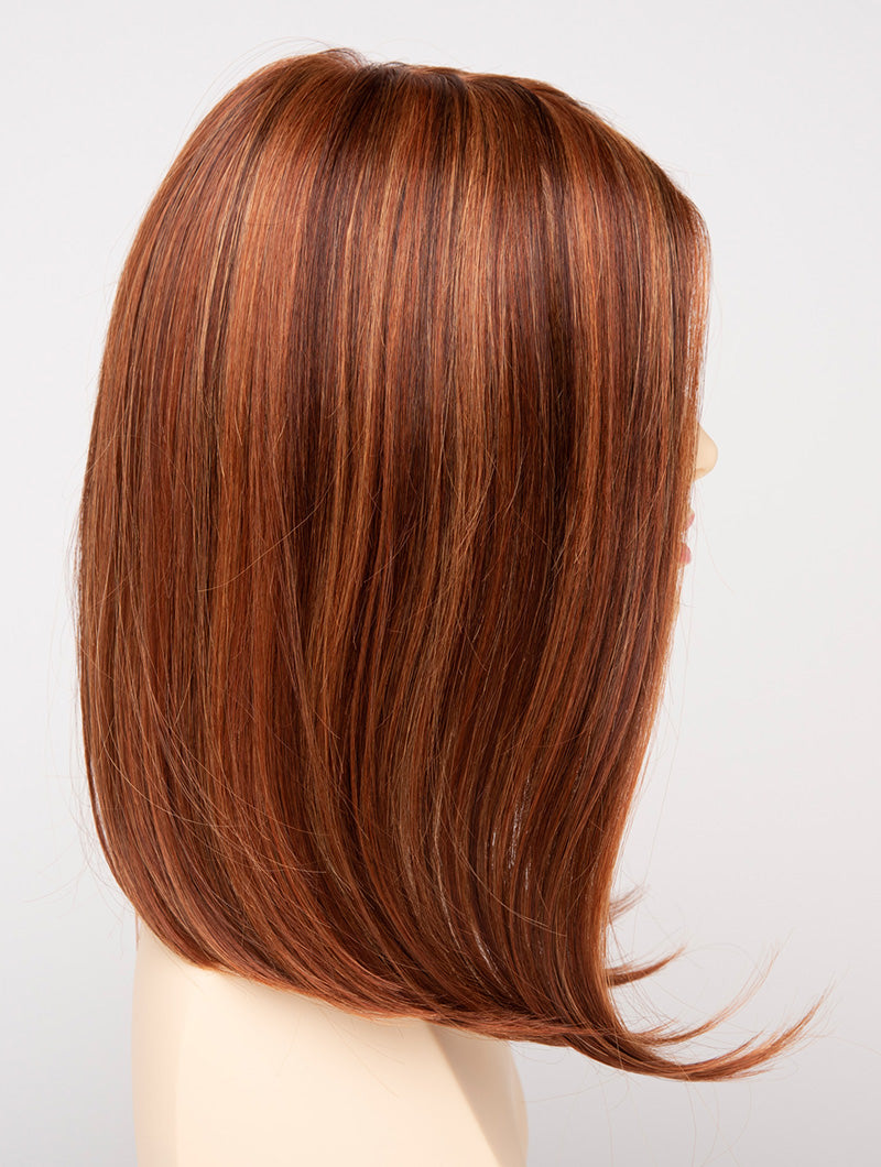profile side of a medium Kinner Beauty Wigs wig for woman on mannequin head