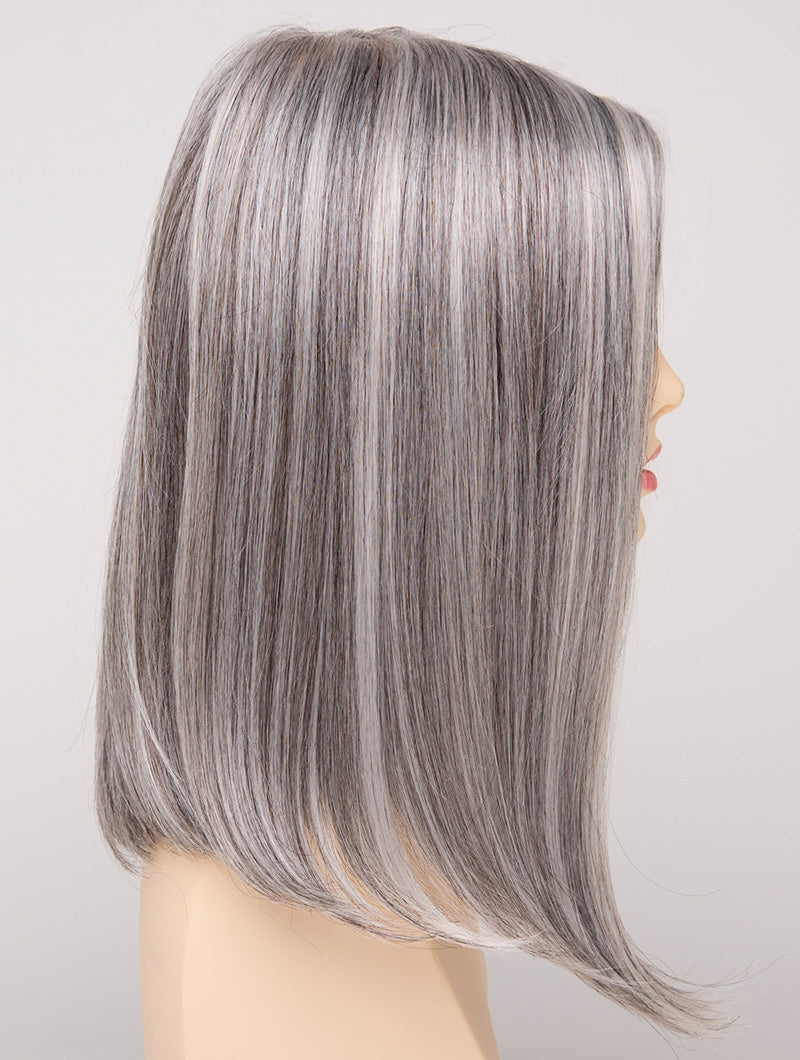 profile side of a medium Kinner Beauty Wigs wig for woman on mannequin head
