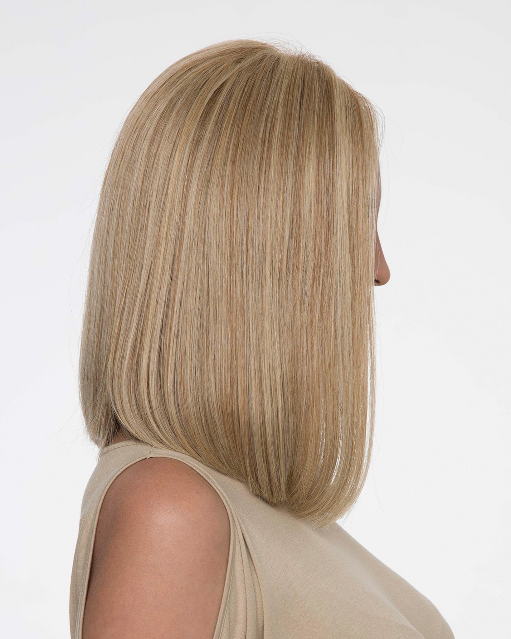 profile side of a medium Kinner Beauty Wigs wig on woman head