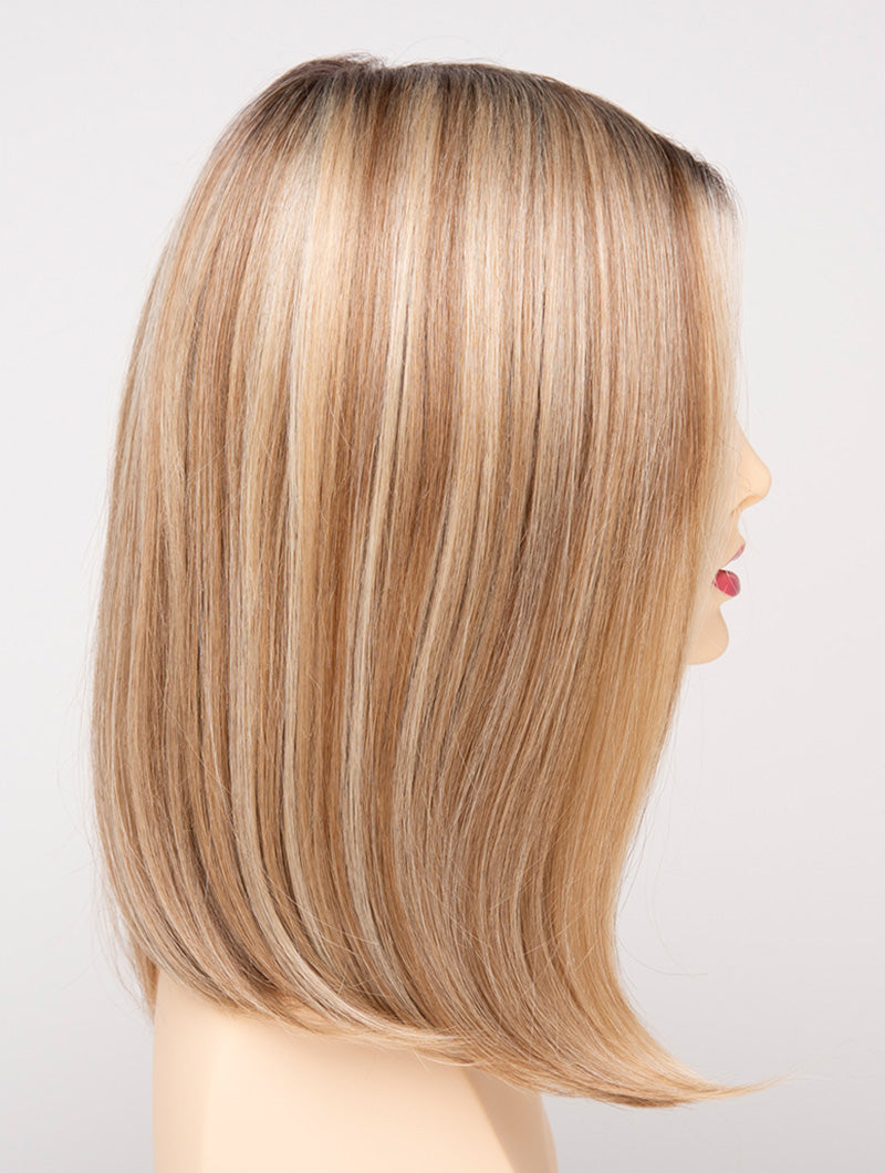 profile side of a medium Kinner Beauty Wigs wig for woman on mannequin head