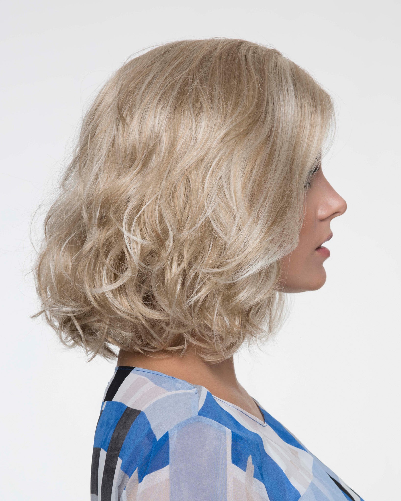 cancer survivor donation with a Cancer Kinship Kinner beauty wig