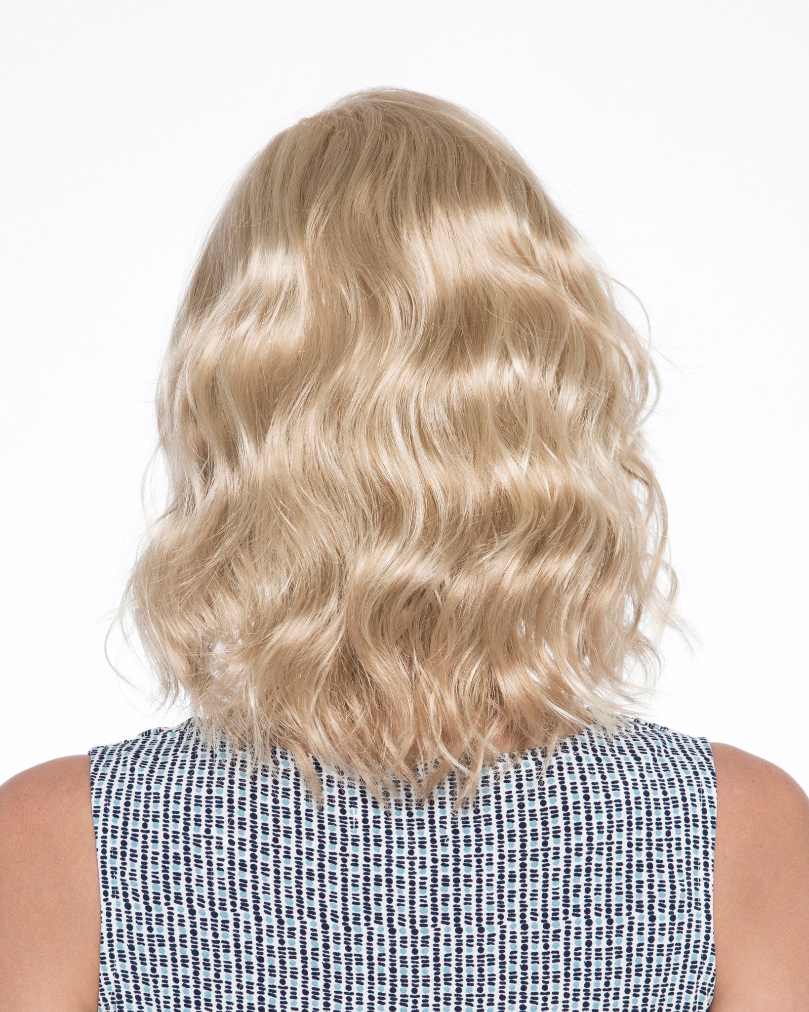 cancer survivor donation with a Cancer Kinship Kinner beauty wig