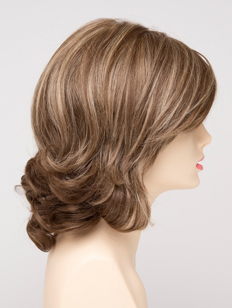 profile side of a medium Kinner Beauty Wigs wig for woman on mannequin head