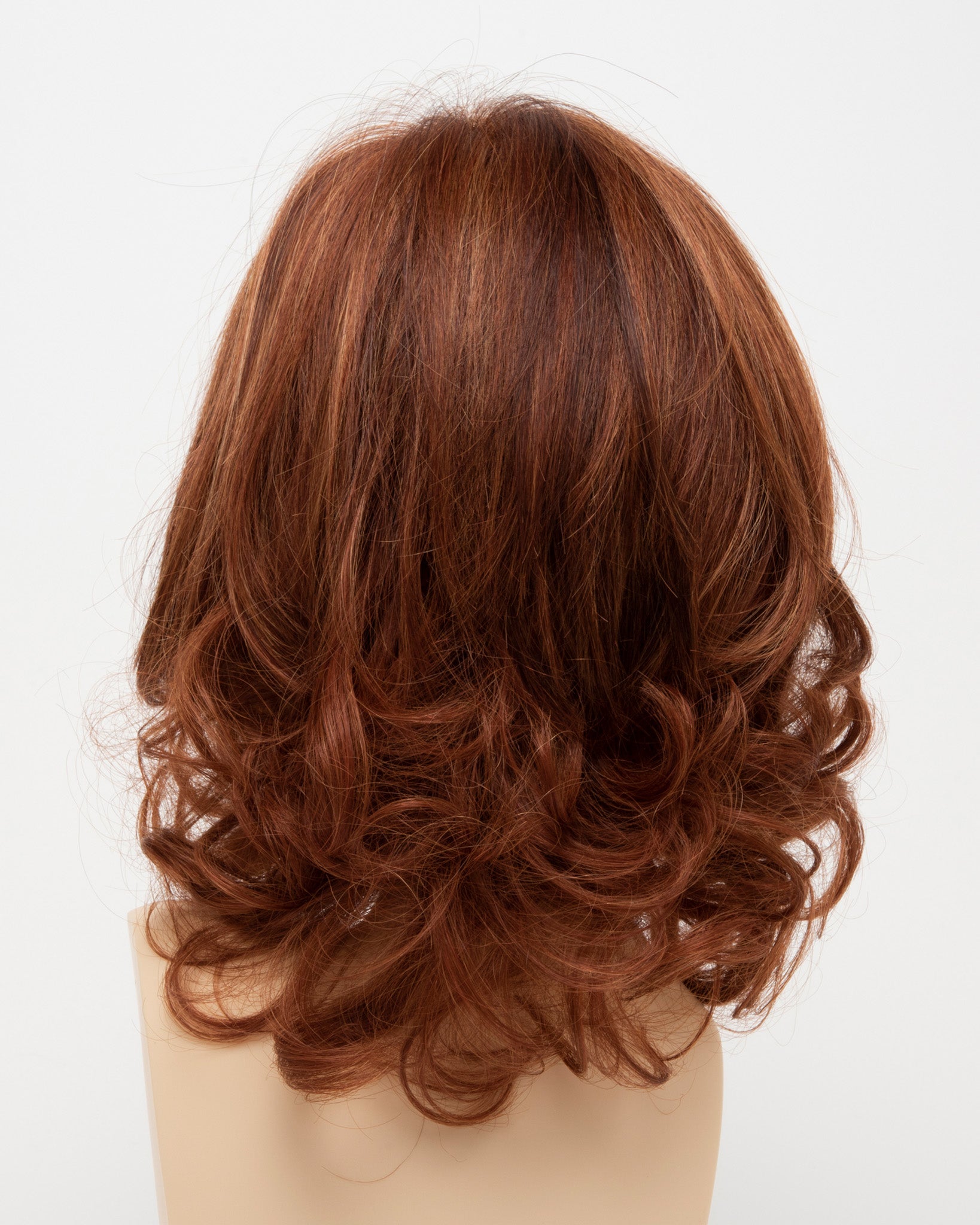 back side of a medium Kinner Beauty Wigs wig for woman on mannequin head