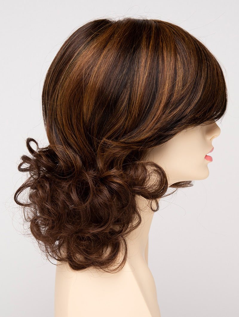 profile side of a medium Kinner Beauty Wigs wig for woman on mannequin head