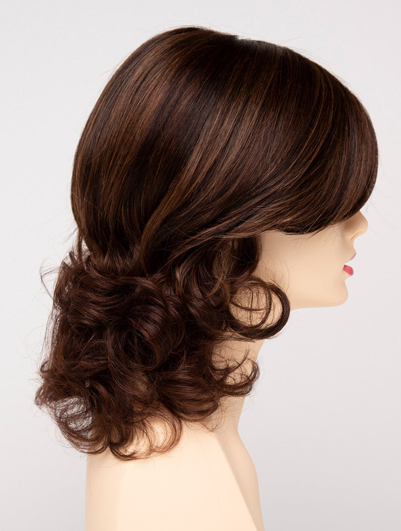 profile side of a medium Kinner Beauty Wigs wig for woman on mannequin head
